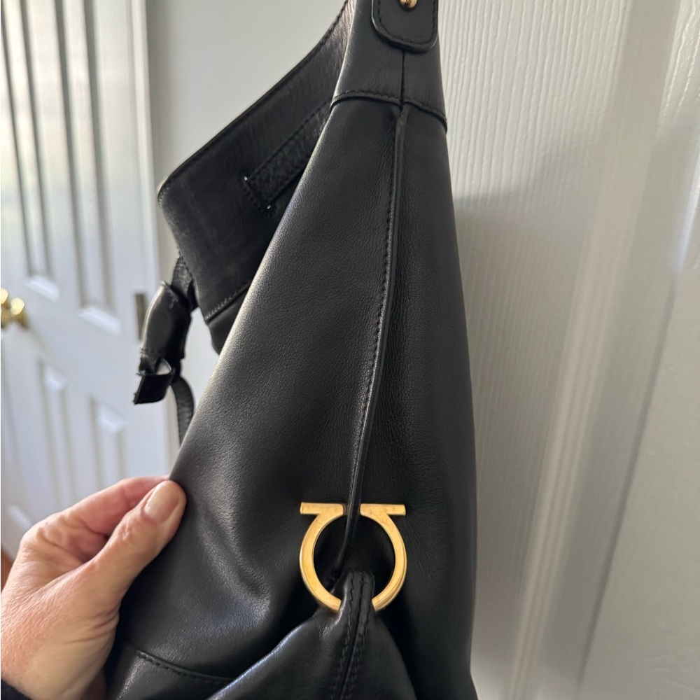 Farragomo Black Leather Shoulder Bag with Gold Accent